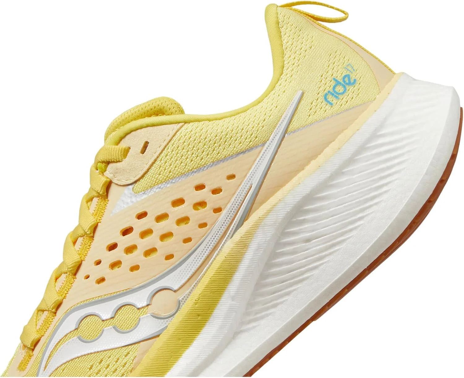 Saucony Women's Ride 17 running shoe in yellow mesh with perforated overlays, silver side logo and thick white sole