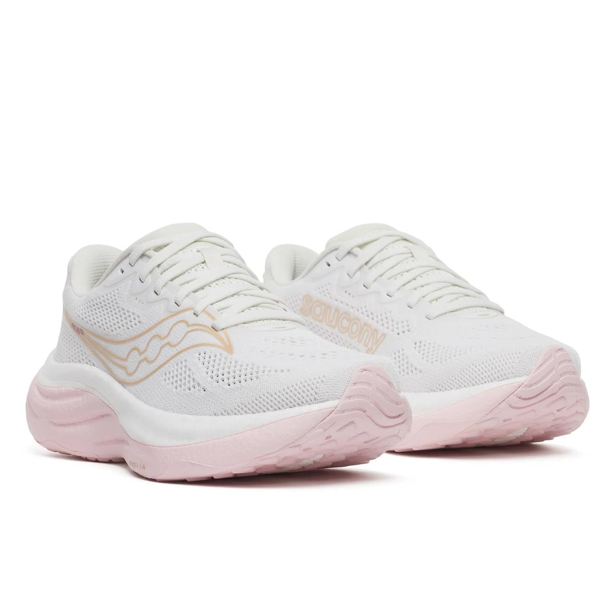 Saucony Women's Ride 19 running shoes in white mesh with pale pink soles, gold accents, and cushioned detailing
