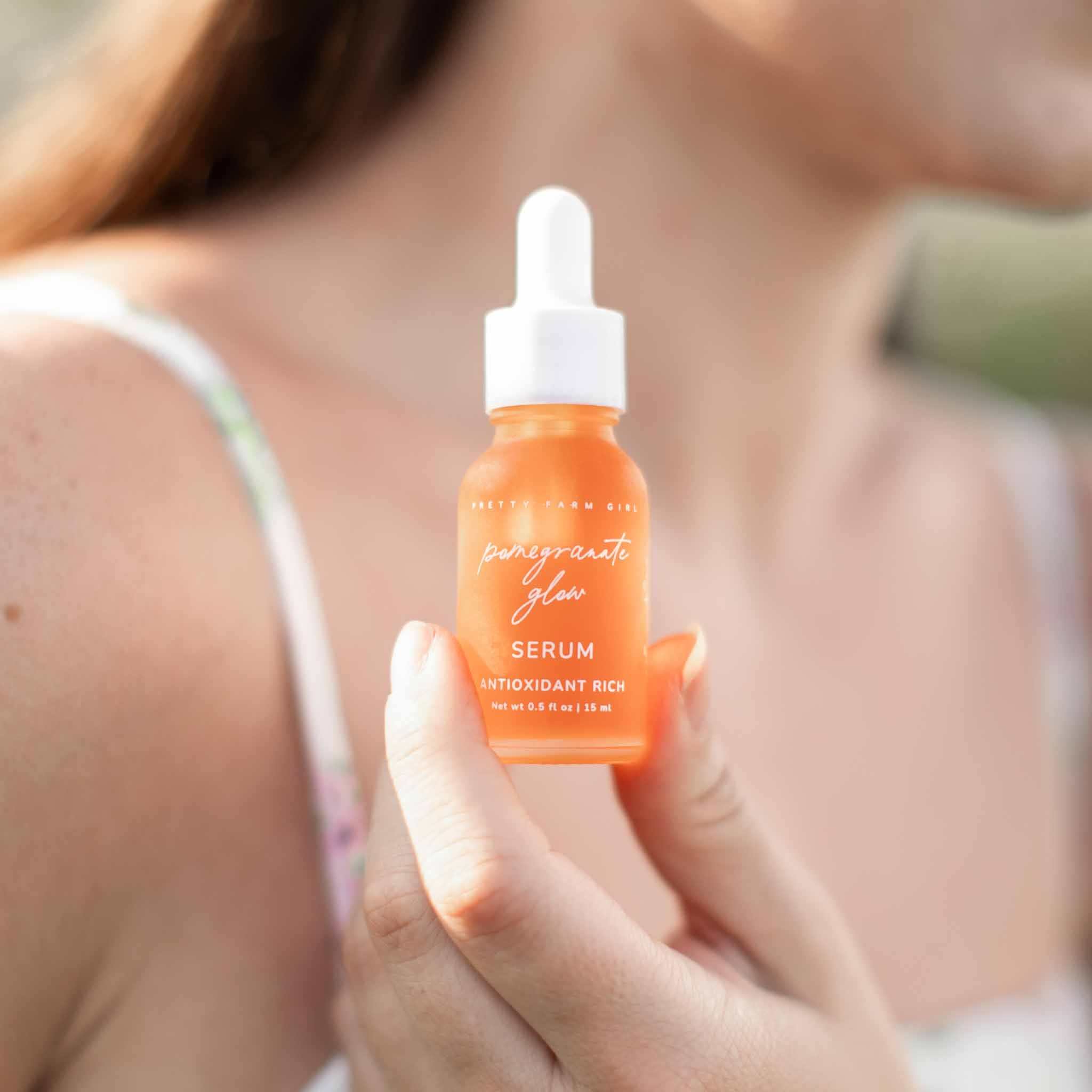 Sensitive Skin Fragrance Free Kit featuring an amber glass Pomegranate Glow Serum bottle with white dropper