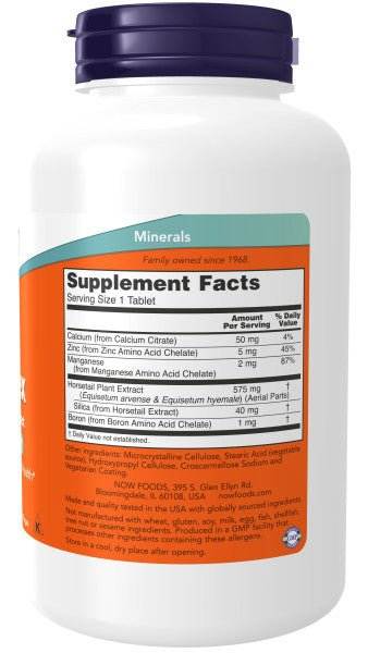 Silica Complex supplement bottle with a white plastic container, purple cap, and orange and teal label