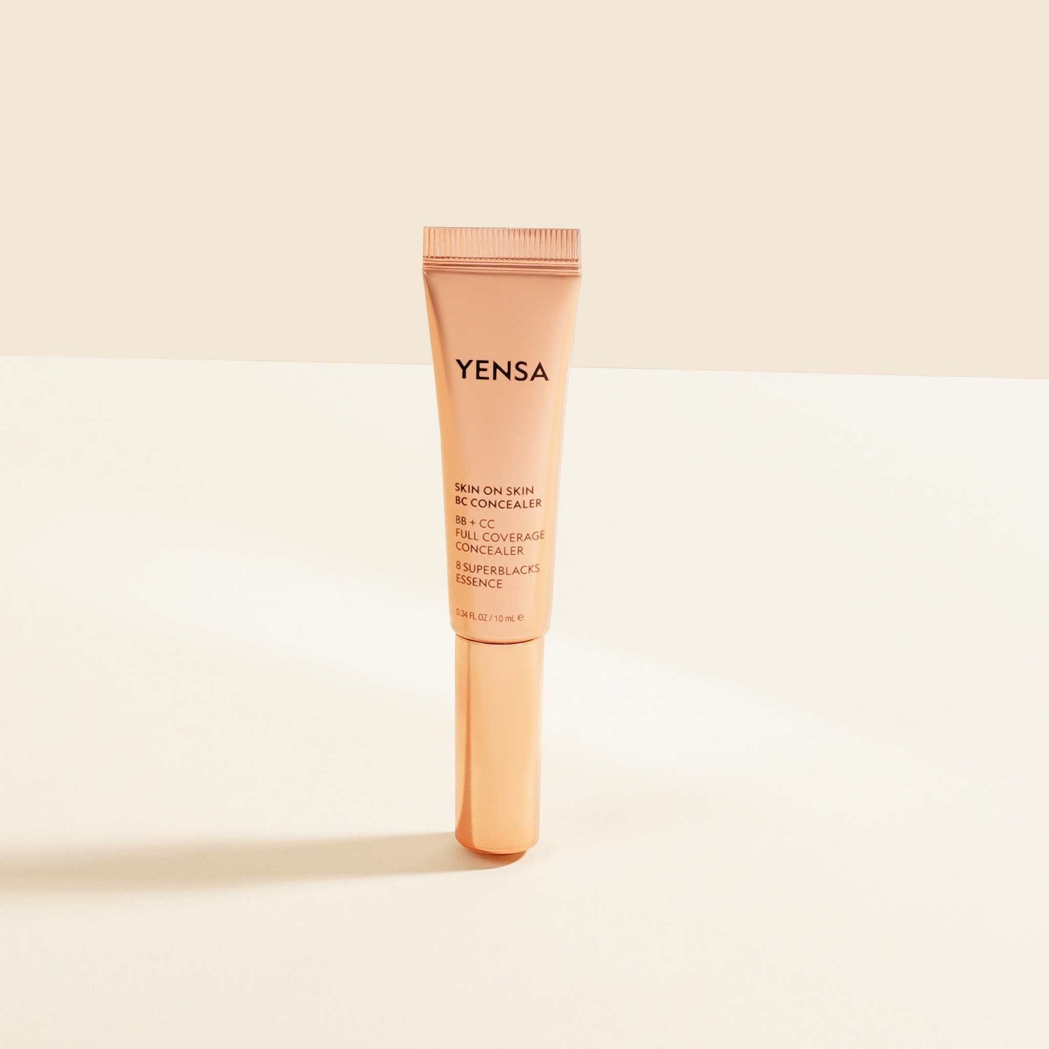 Skin On Skin BB concealer in a peach-toned squeeze tube with a tapered cap and black printed label