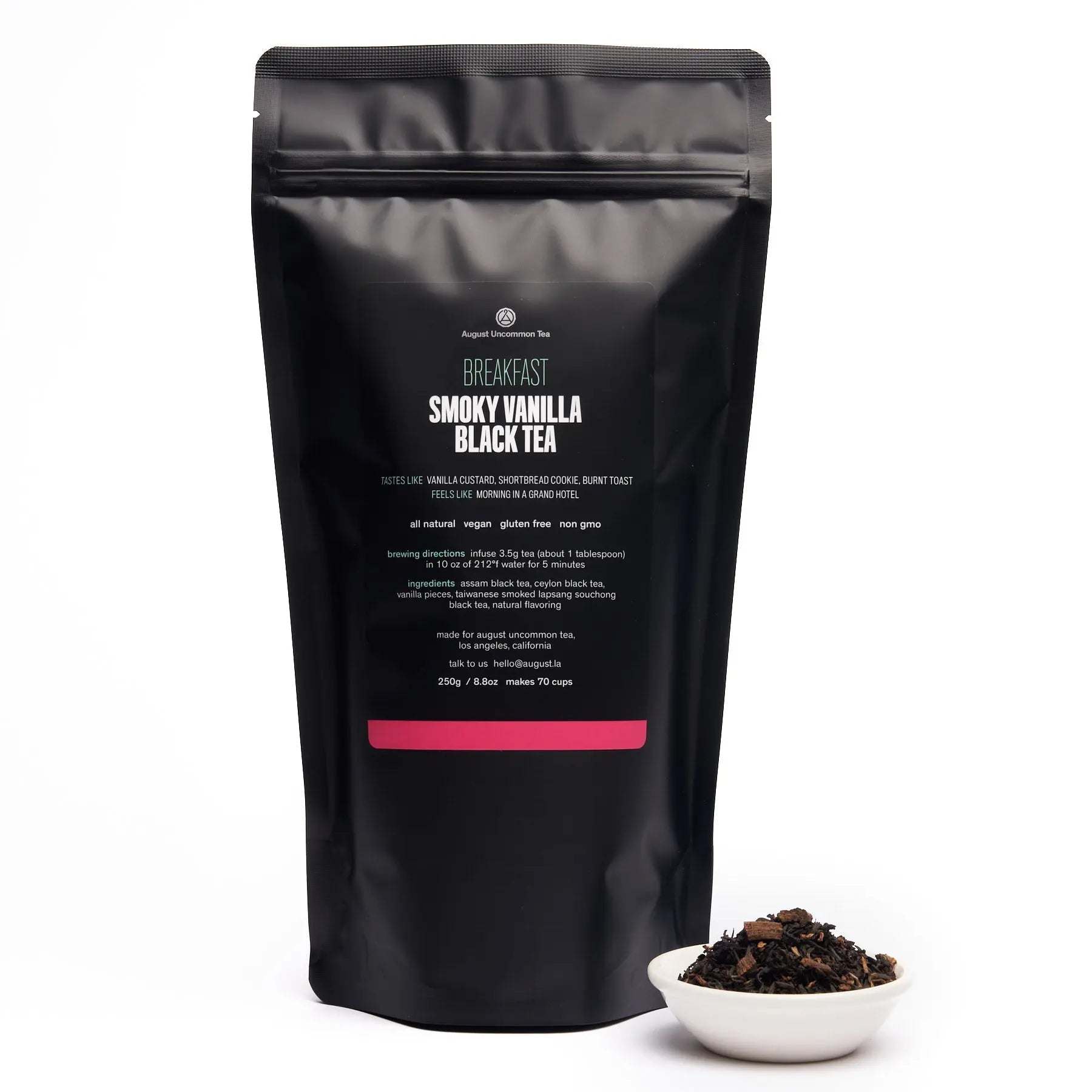 Smoky Vanilla Black Tea in a matte black resealable pouch with a bowl of loose black tea leaves