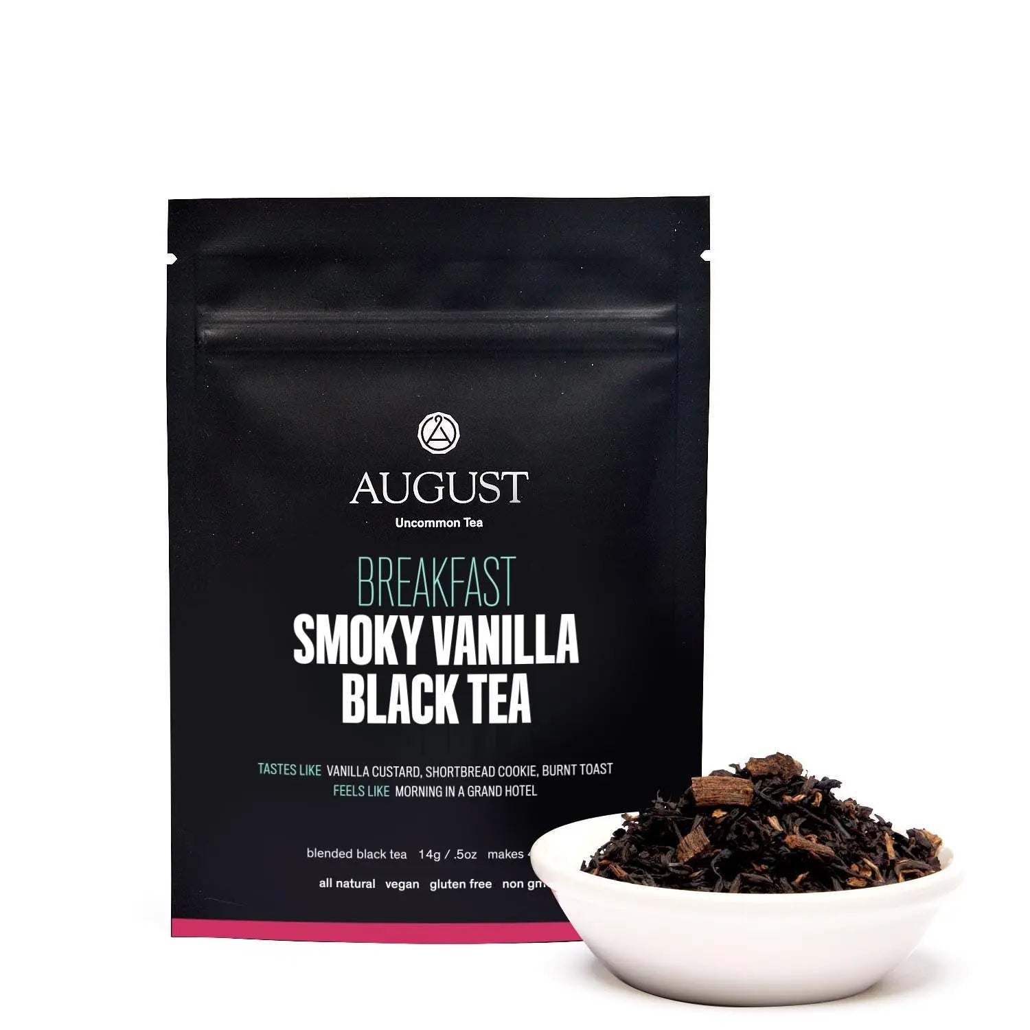 Black tea blend in a matte black Smoky Vanilla Black Tea pouch with vanilla pieces and loose leaves in a white bowl