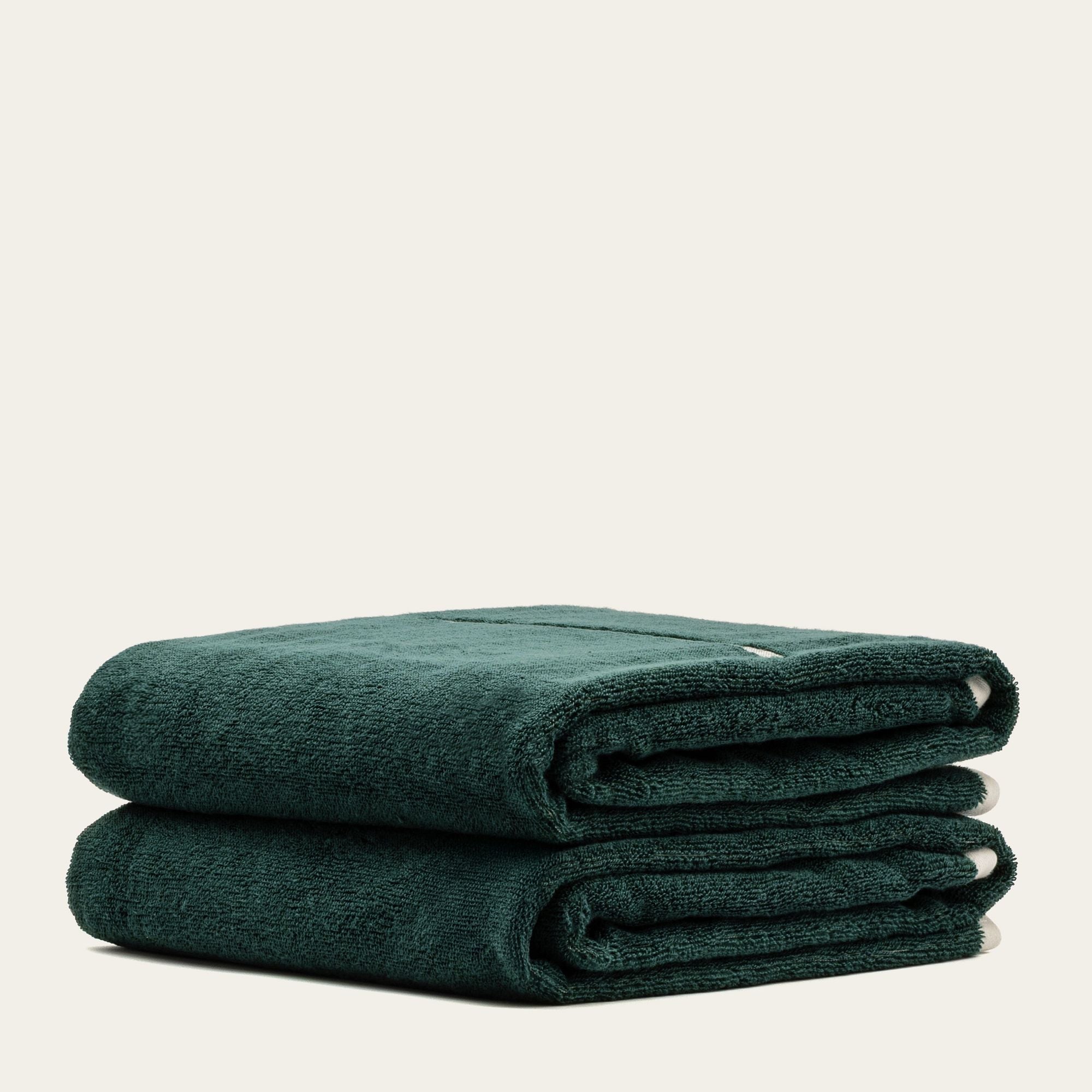 Sorrel Australian Cotton towels in deep teal, plush textured cotton with folded edges and a small woven label