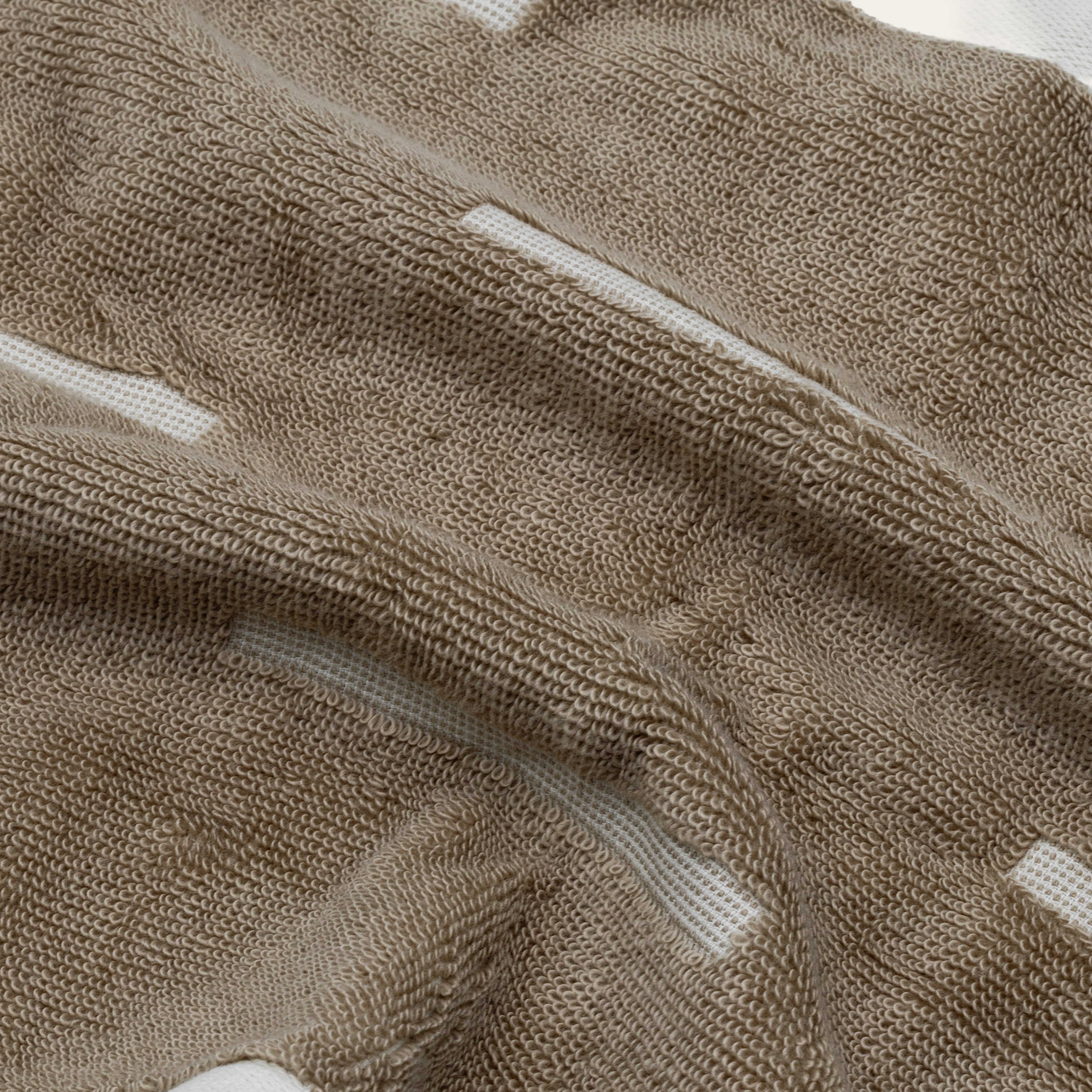 Soft sorrel Australian cotton towels with geometric accents and locker loop