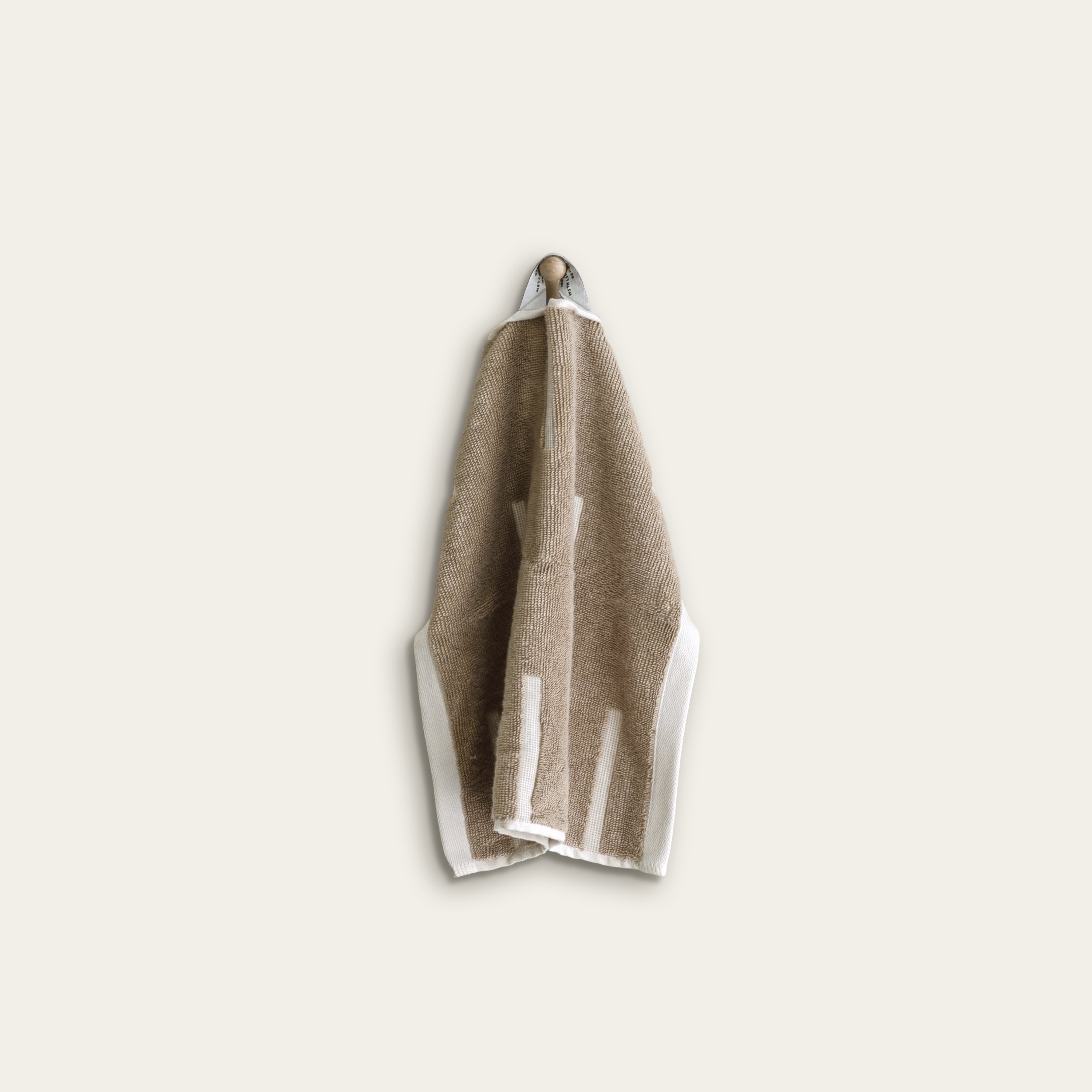 Sorrel Australian cotton towels in sand tone with geometric accents