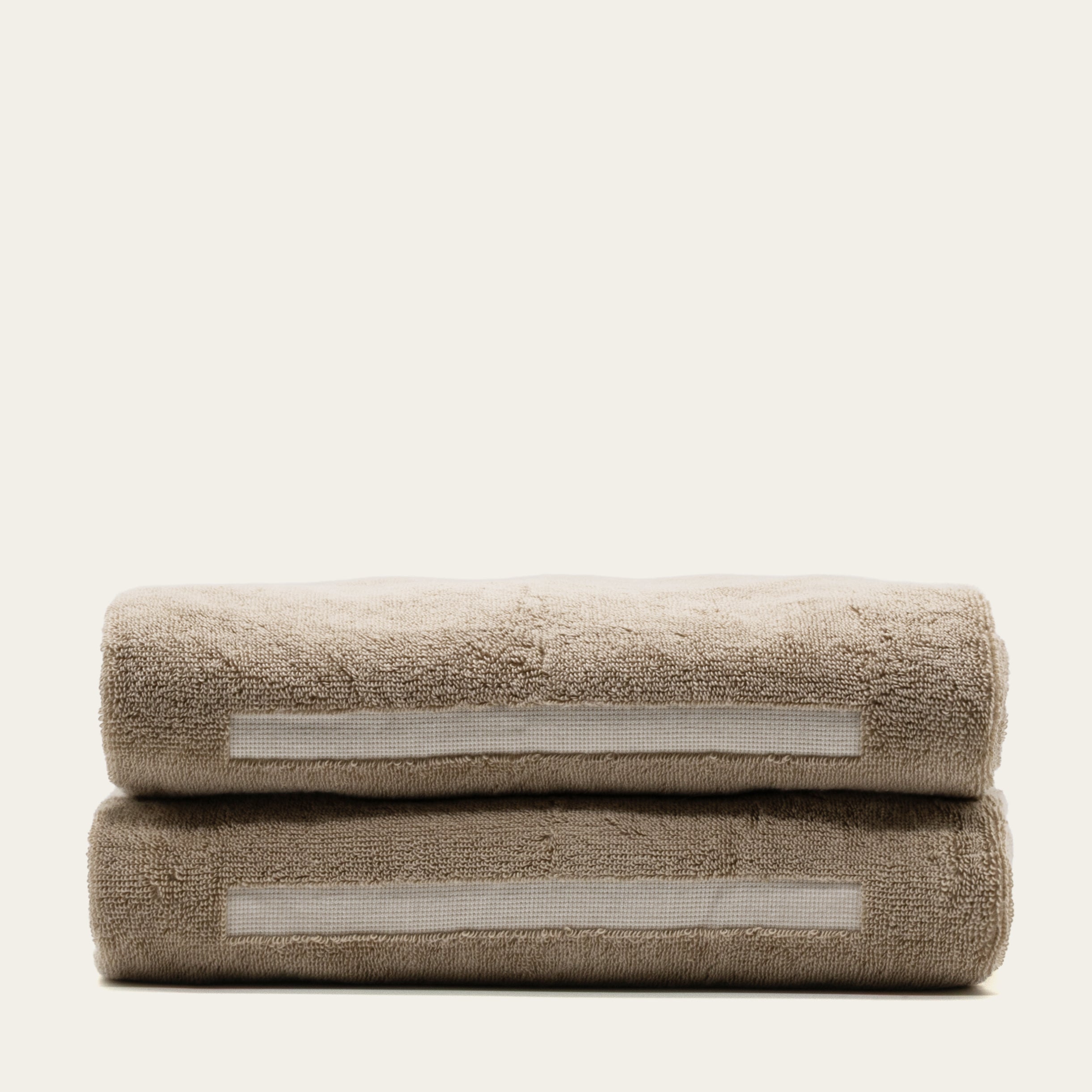 Sorrel Australian cotton towels set in sand tone with geometric accents