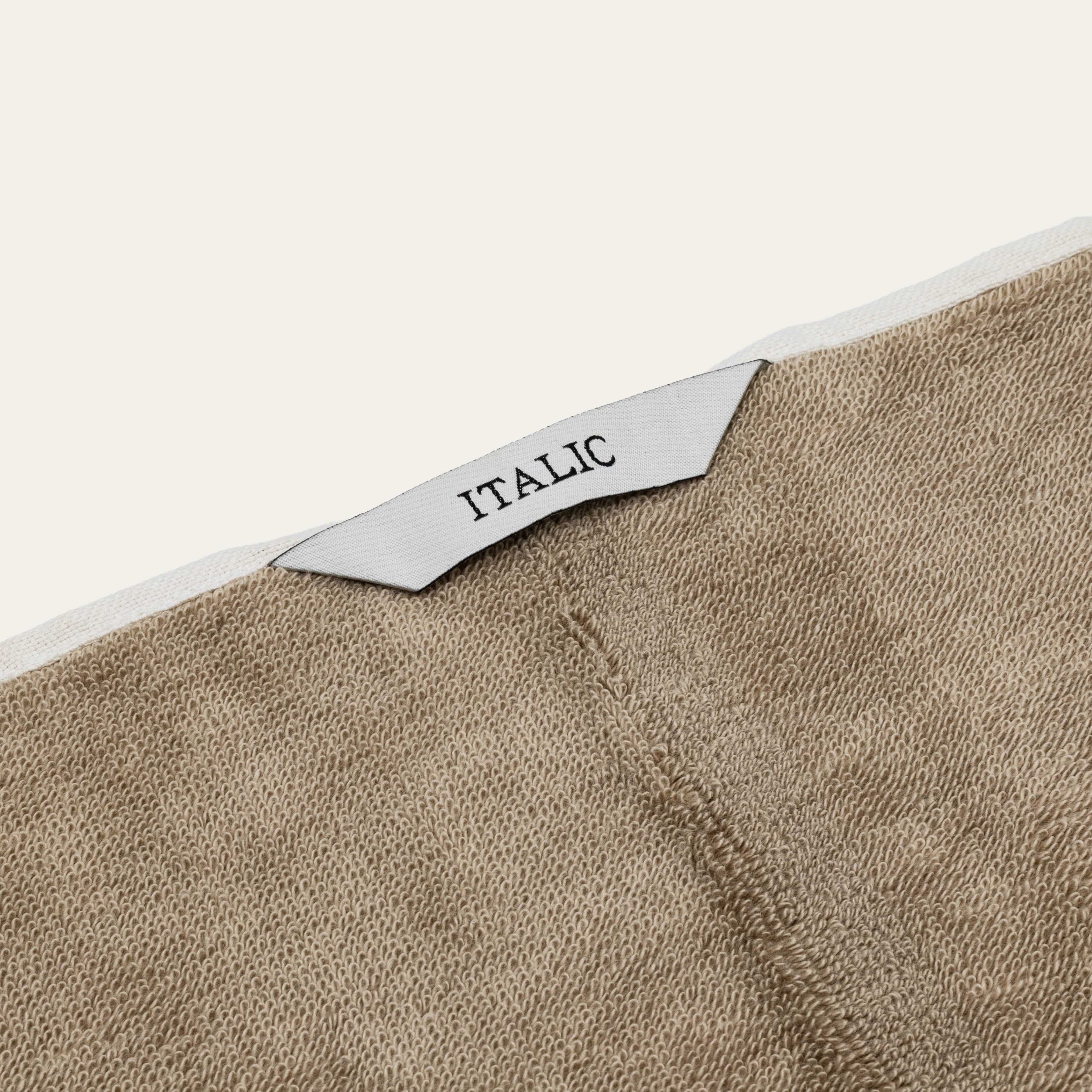 Sorrel Australian cotton towels in sand tone with geometric accents