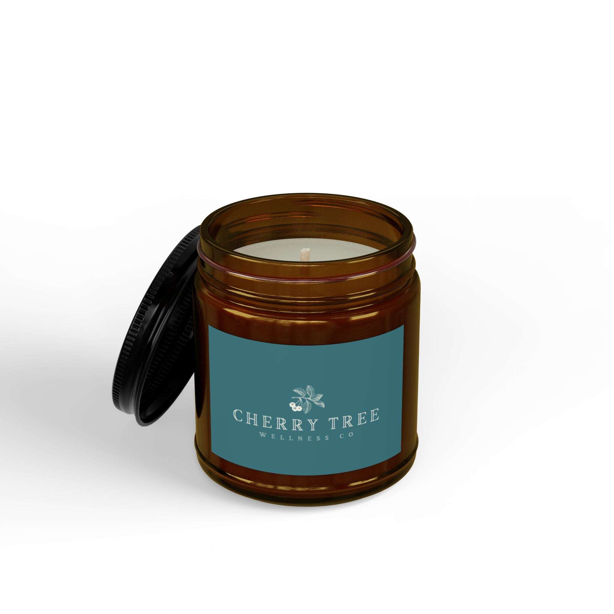 Soy Candle in amber glass jar with black lid, featuring a teal label with Cherry Tree Wellness Co. logo