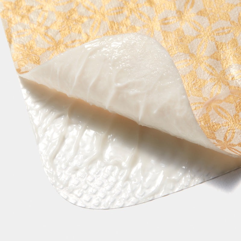 sulwhasoo concentrated ginseng mask in white creamy sheet with embossed texture and folded layered design