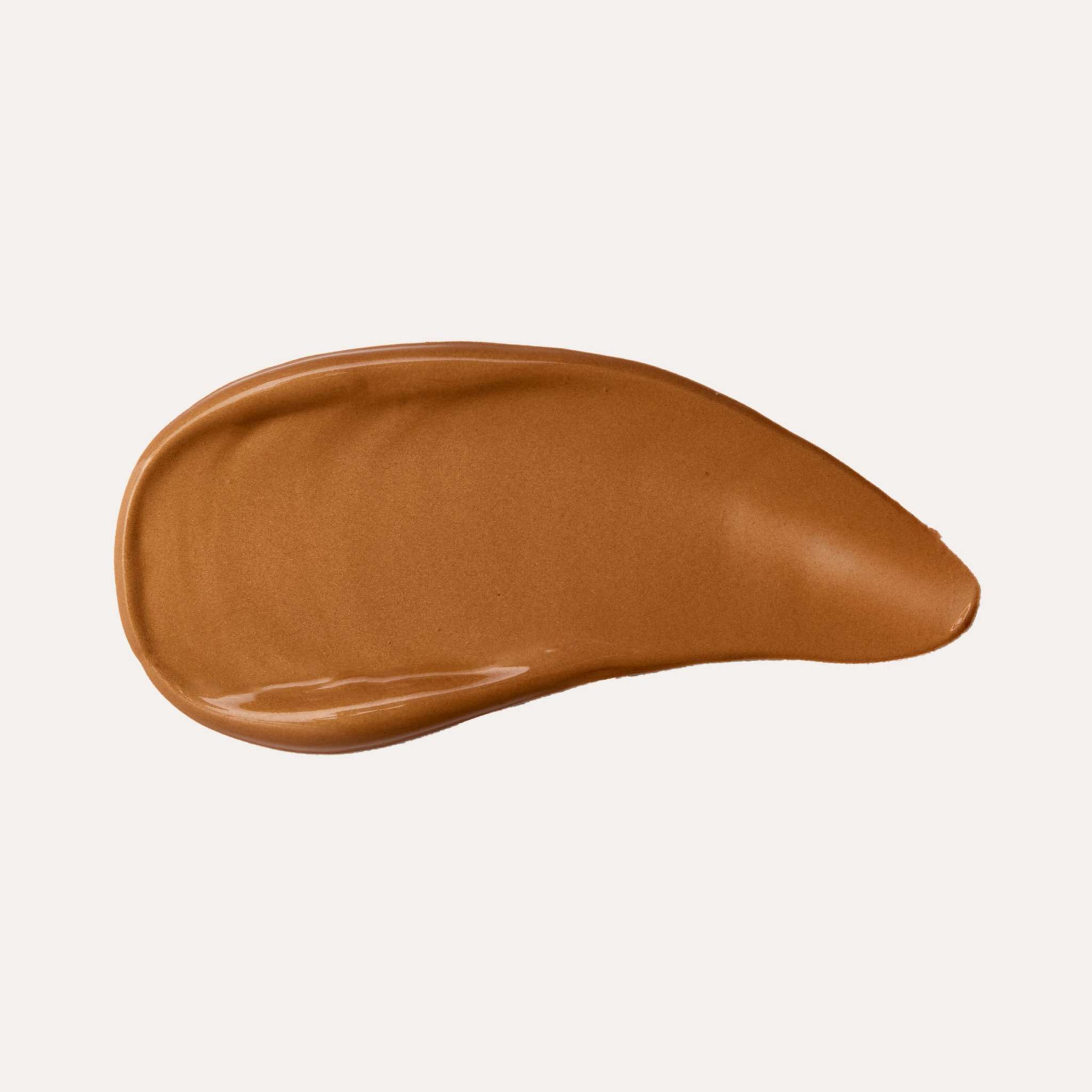 Super Serum Silk Bronzing Drops shown as a smooth, glossy bronze-brown serum swatch with a rich, creamy texture