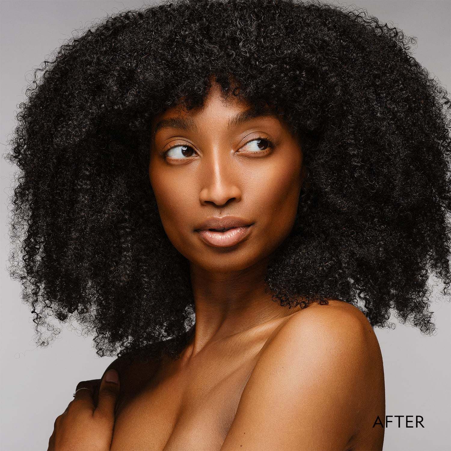 Super Serum Silk Matte Foundation on a model with deep brown skin and a natural matte finish