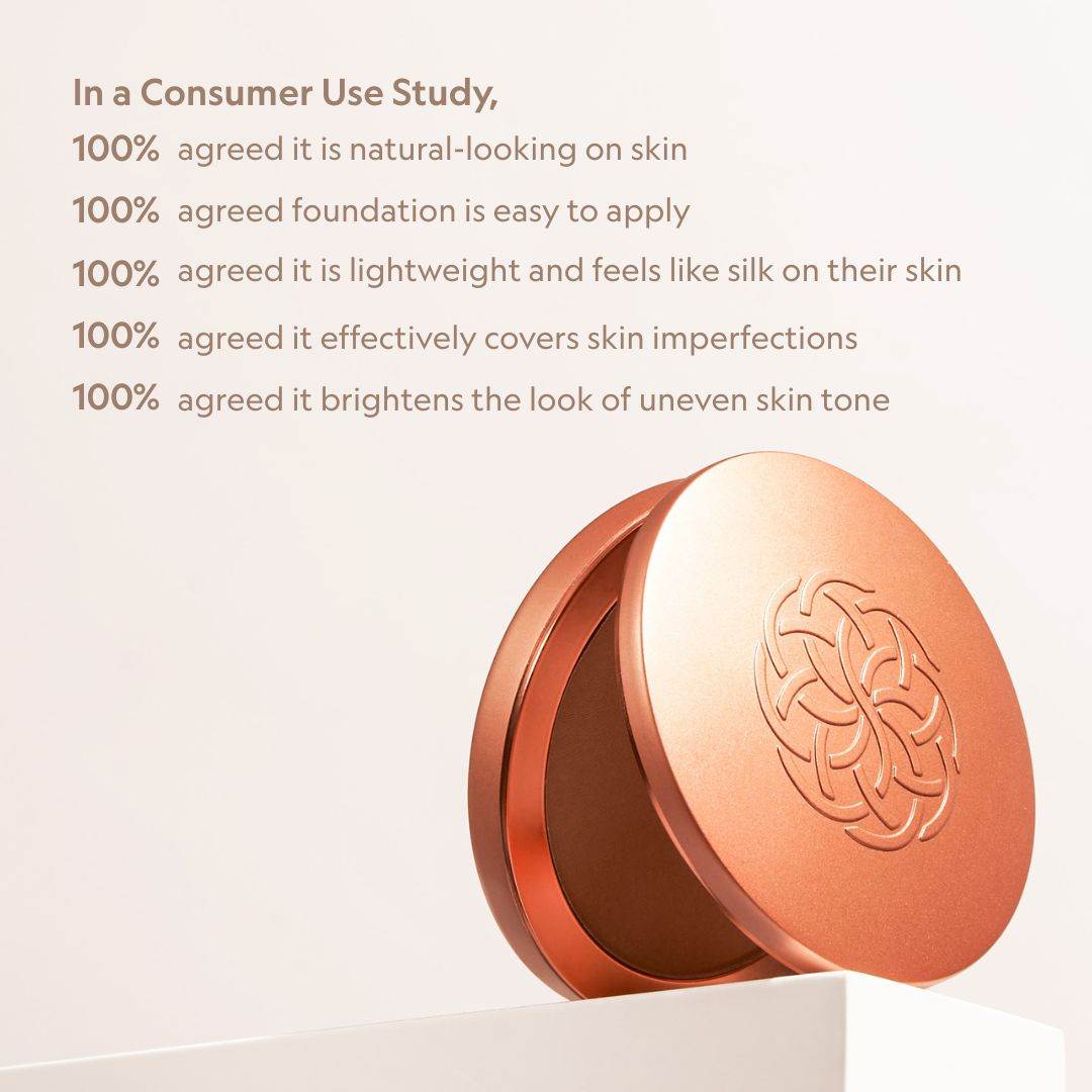 Super Serum Silk Matte Foundation in a rose gold compact with embossed interwoven design and pressed powder