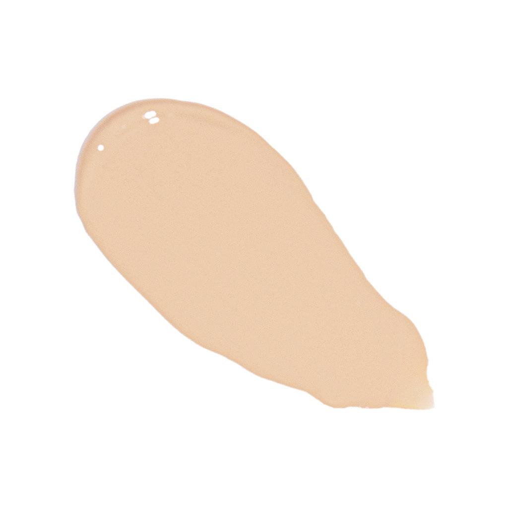 Super Serum Silk foundation swatch in a warm light beige shade with a smooth, creamy texture and natural glow finish
