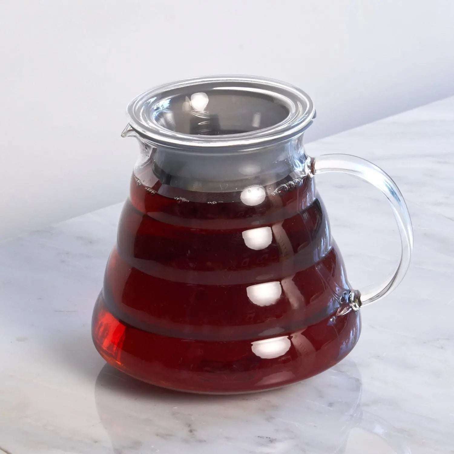 Tea For Two - Starter Tea Set glass teapot with clear handle, stainless steel lid, and deep red brewed tea