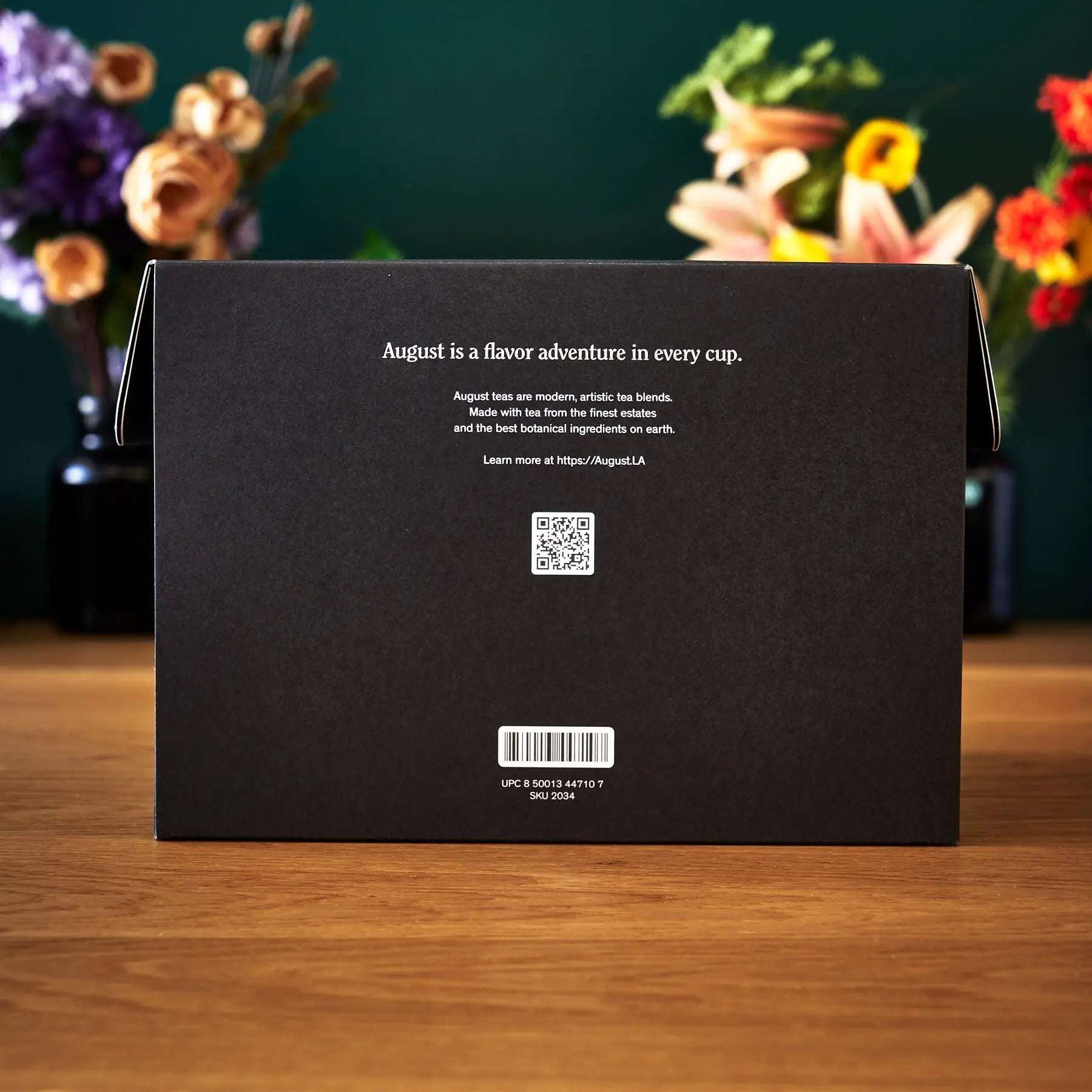 Tea Library - Deluxe black cardboard sampler box with white printed text, QR code and barcode on the back