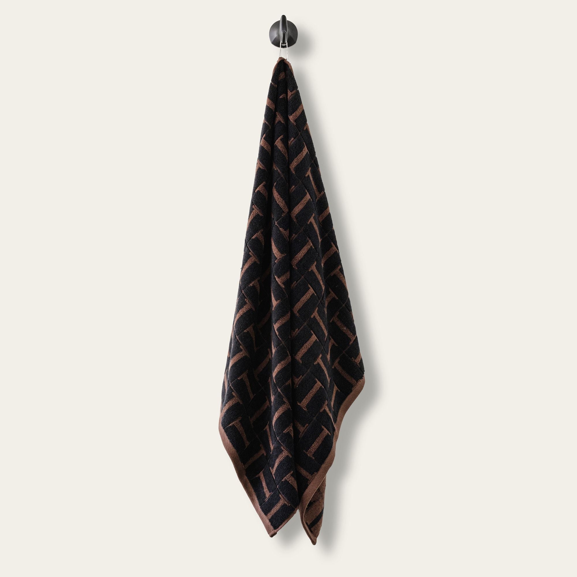 Tessera Australian cotton towels in moody coastal tones with geometric texture