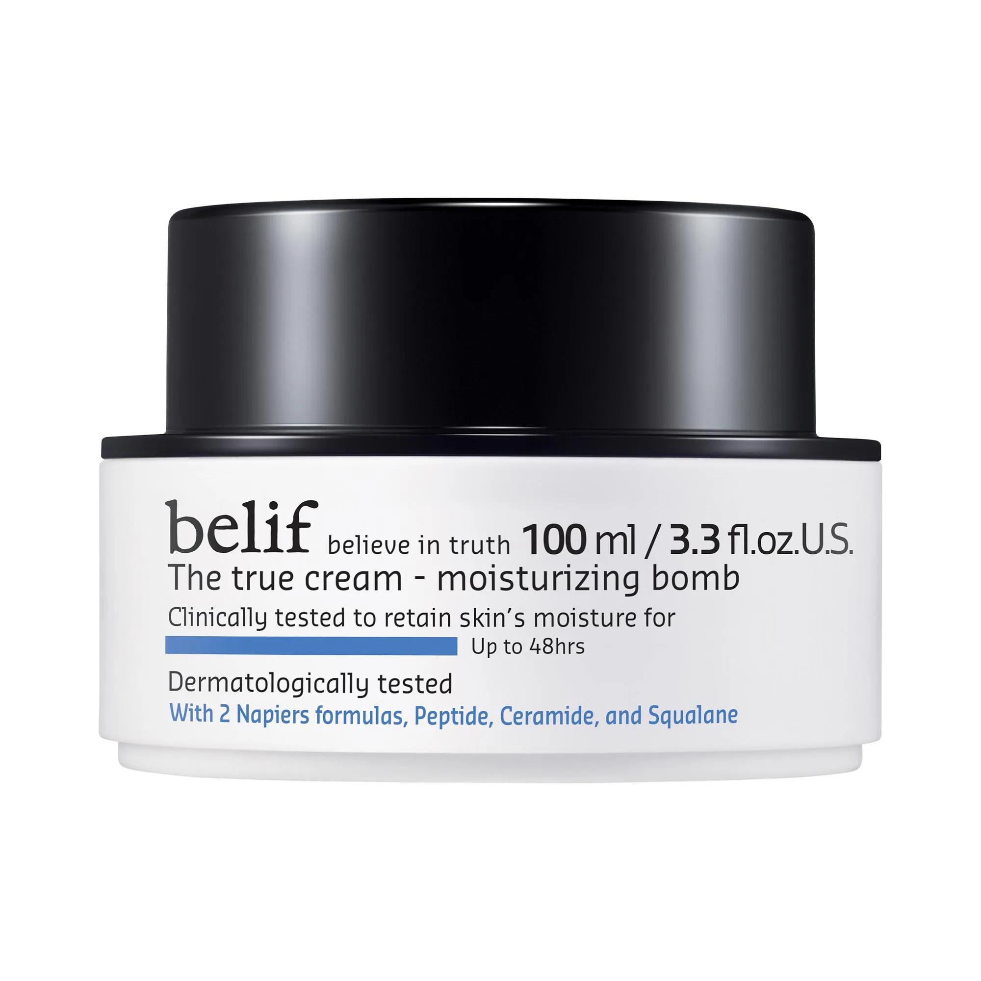 Moisturizer jar labeled The True Cream, with a white container, black lid, and blue text highlighting peptides, ceramides, and squalane.