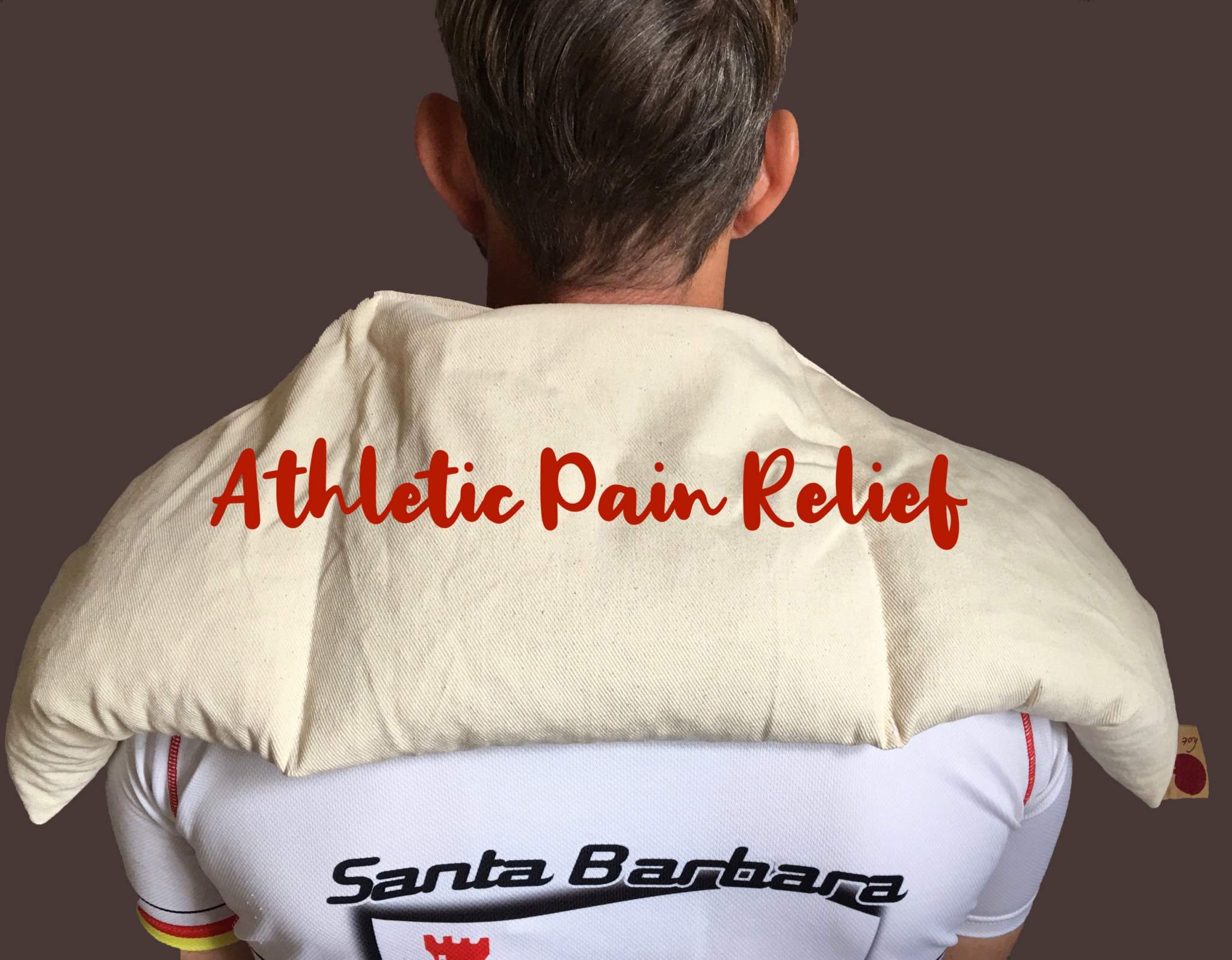 Triple Square Pillow in cream natural cotton denim, long segmented shape draped across the shoulders with red lettering