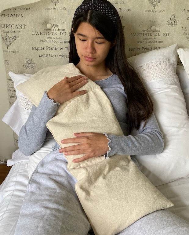 Triple Square Pillow in natural unbleached cotton denim, a long rectangular pillow with softly rounded ends and a plain finish