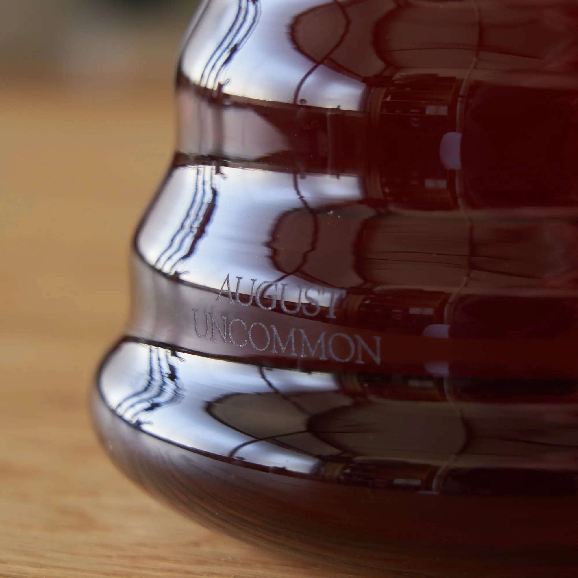 Two Cup Glass Teapot in clear heatproof glass with dark brewed tea and August Uncommon branding