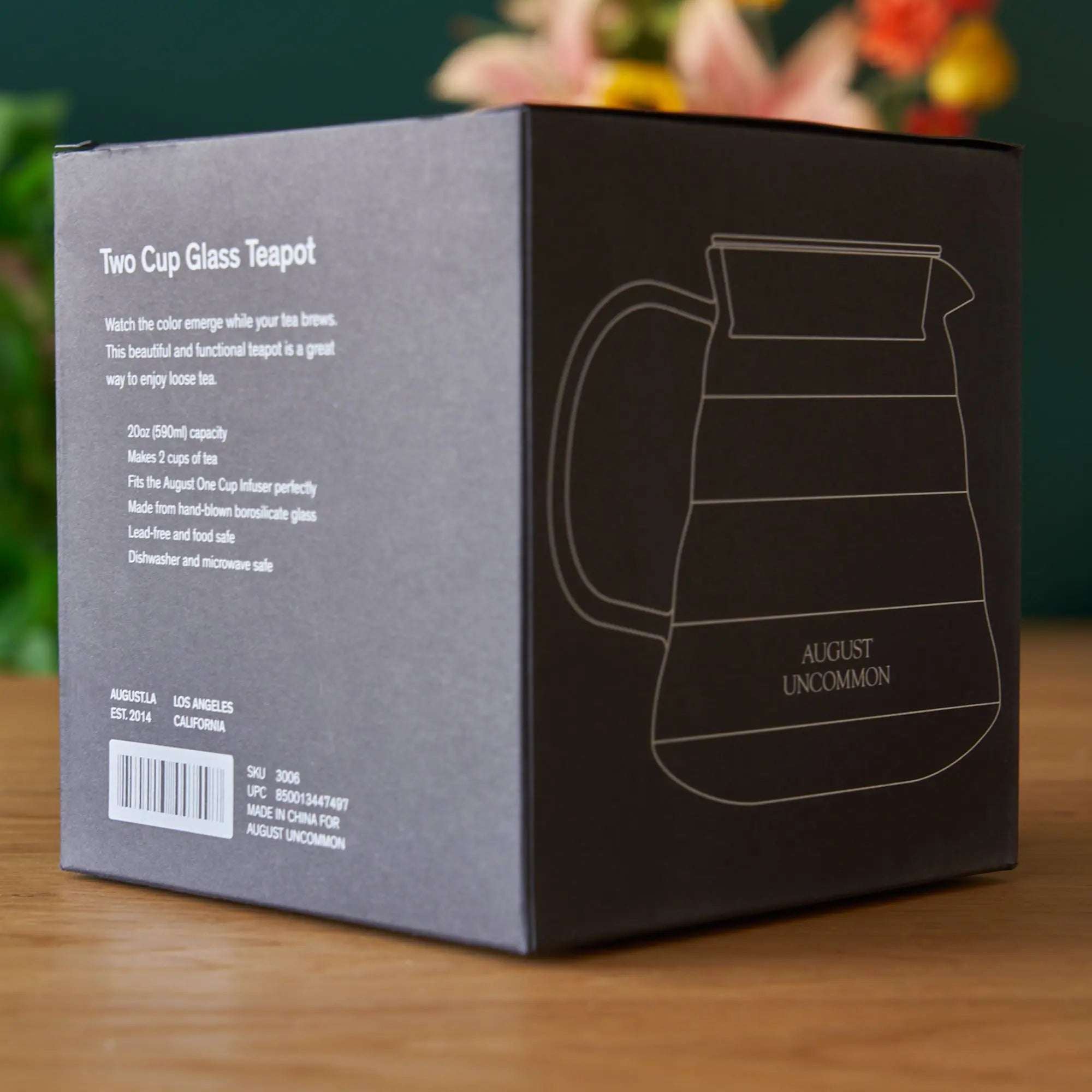 Two Cup Glass Teapot packaging in grey and black with a white outlined teapot illustration and product details