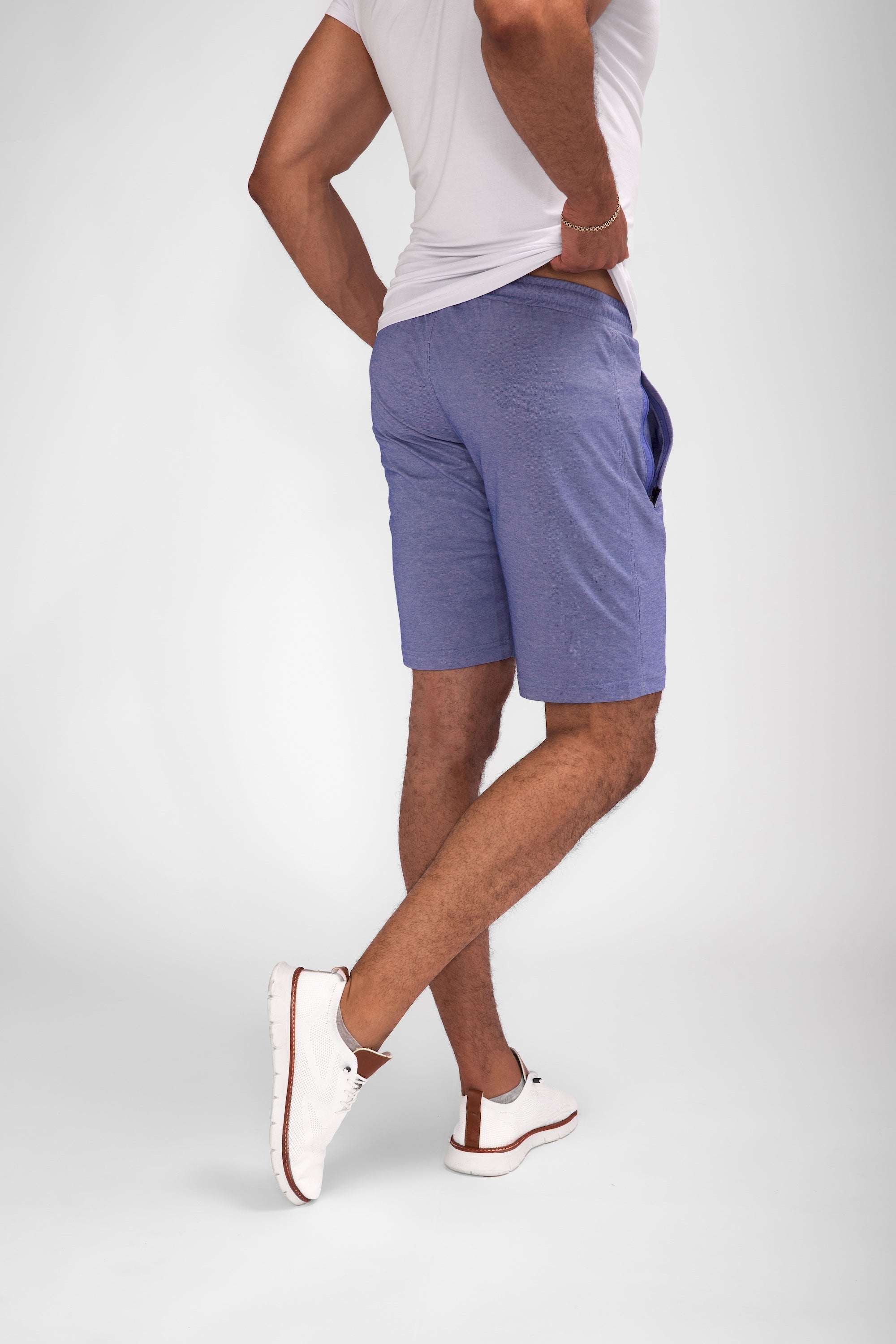 Urban Stride All-Day Wear Shorts in muted blue, with a solid pattern, relaxed fit, and knee-length cut