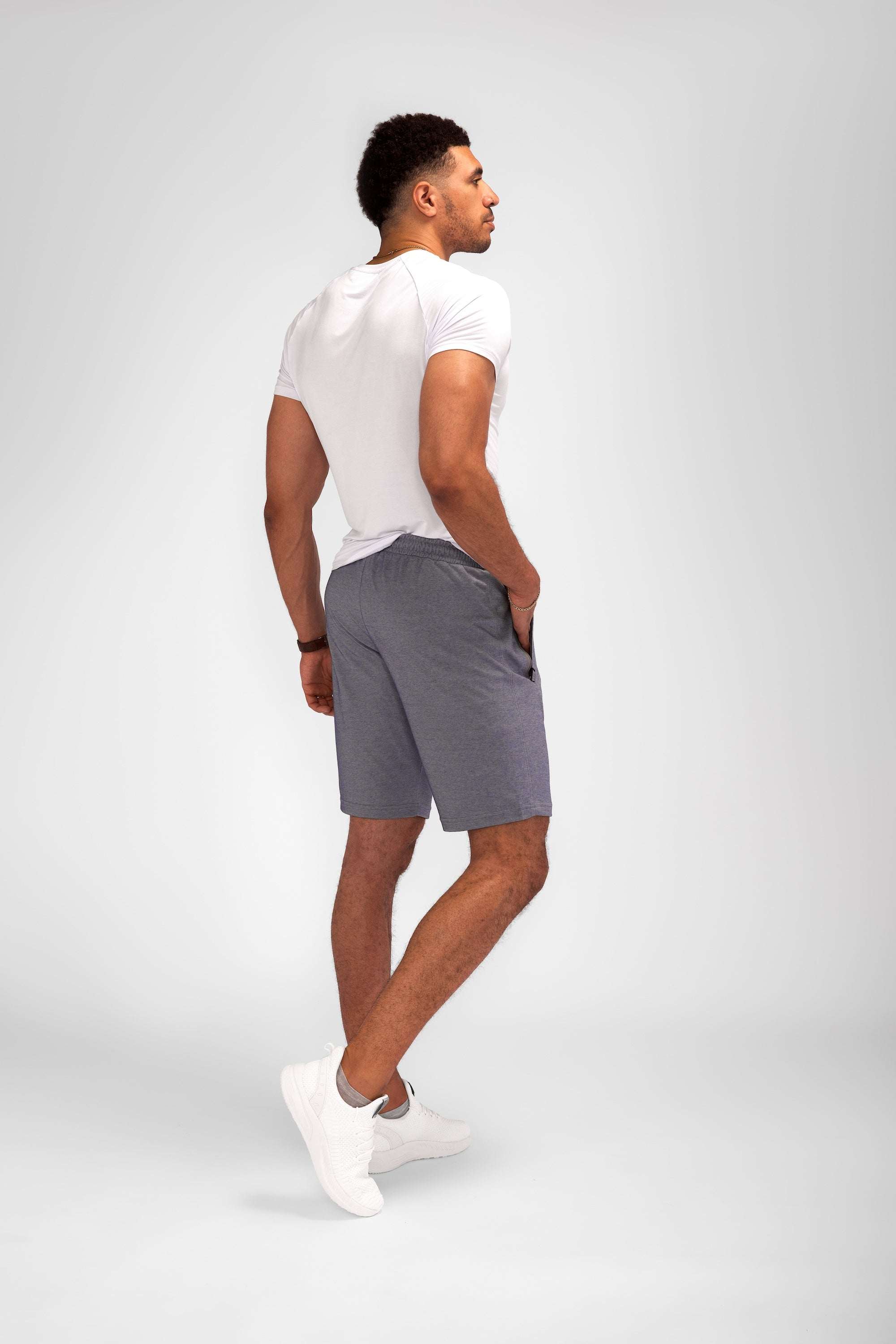 Urban Stride All-Day Wear Shorts in solid grey woven fabric, with a relaxed fit and knee-length cut