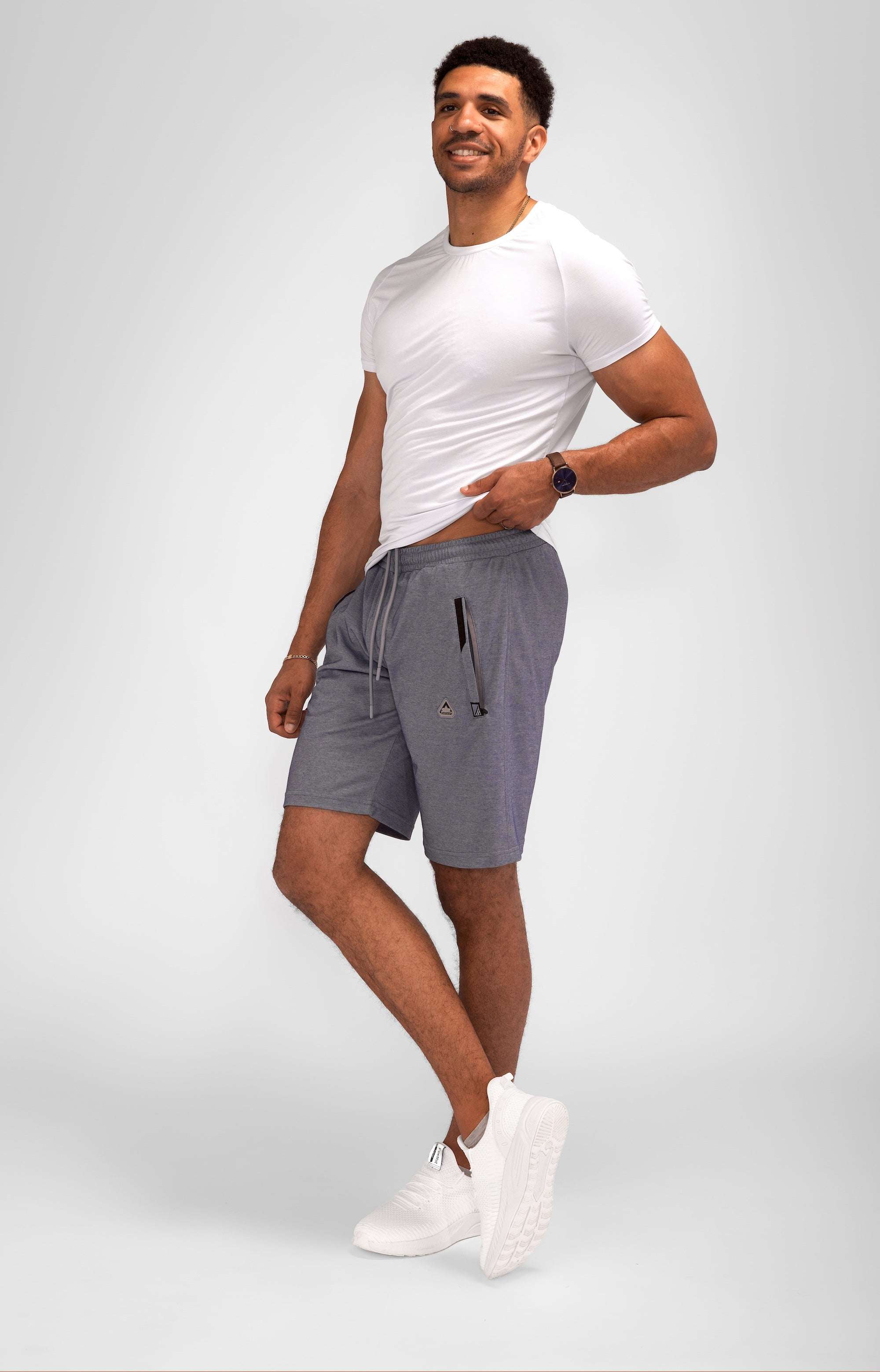 Urban Stride All-Day Wear Shorts in heather gray with a relaxed fit, drawstring waist, and zippered pocket