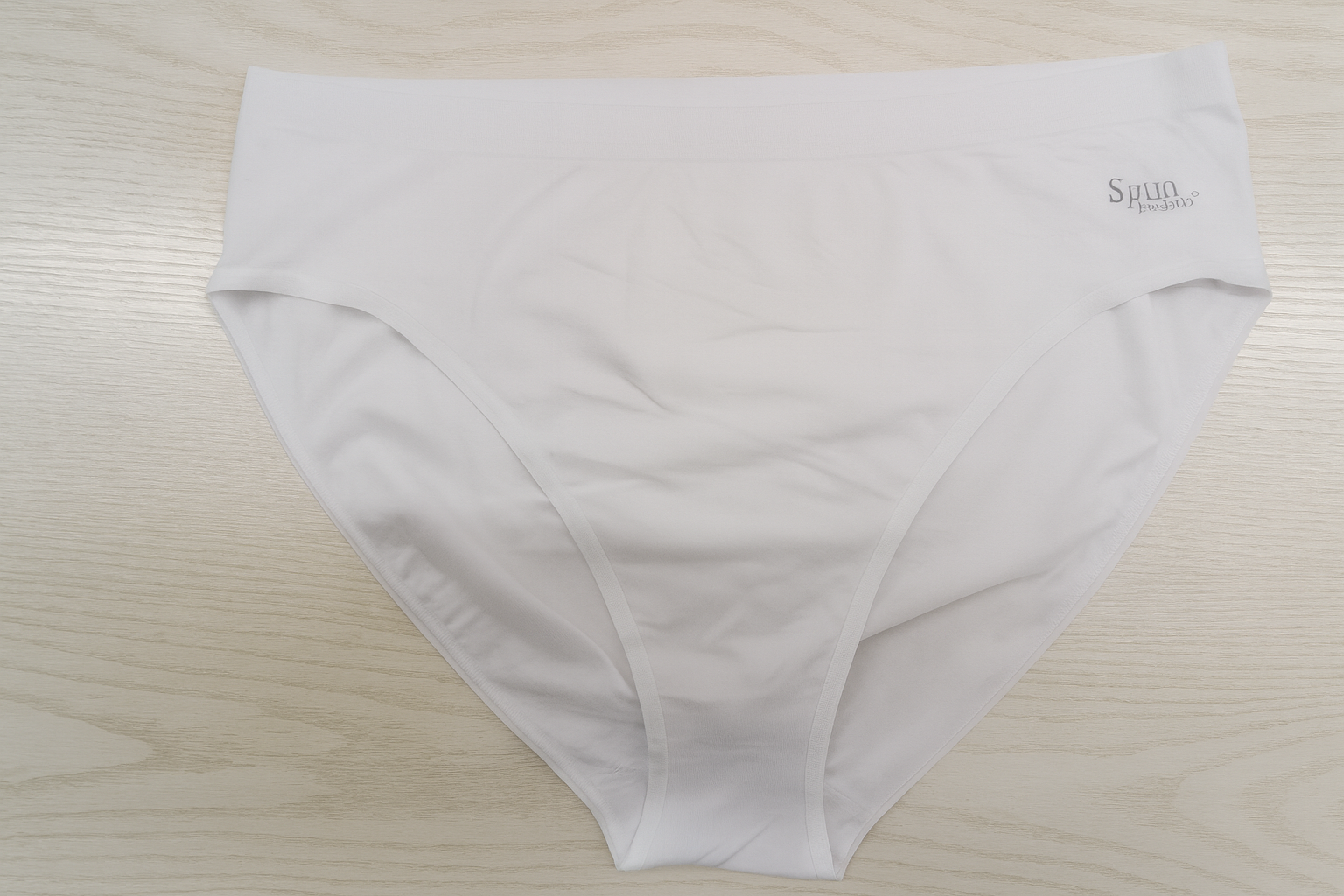 Women's Bamboo/Cotton high leg brief in white, with a smooth, plain finish, wide waistband and small logo