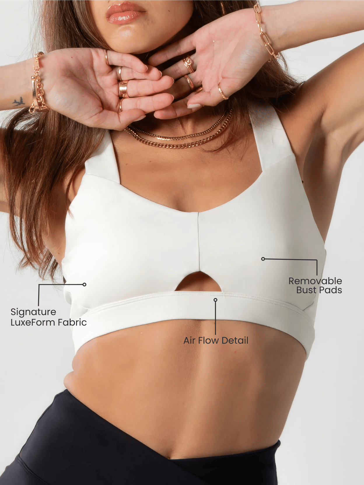 Women's Heart Neckline Sports Bra in white stretch fabric, with a heart-shaped neckline, front cutout and removable bust pads