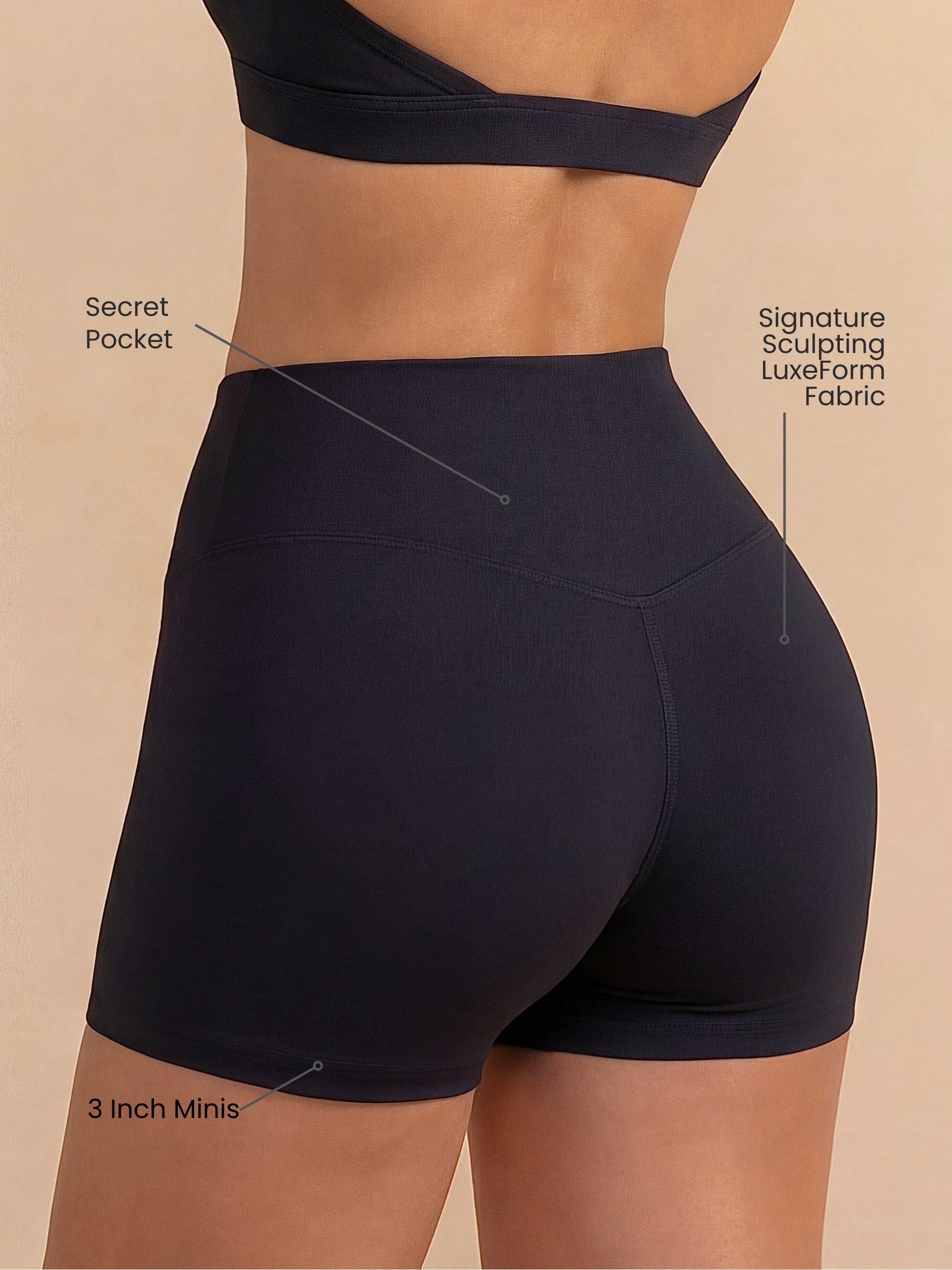 Women's Mini Sculpting Shorts in black matte fabric, with a high criss-cross waistband, 3-inch inseam and secret back pocket
