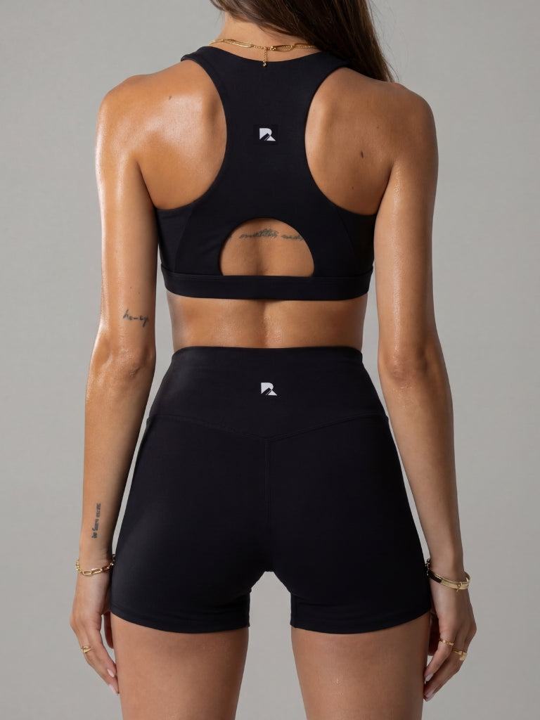 Women's Sculpting Workout Shorts in black stretch fabric, fitted 5-inch length with a wide high-rise waistband