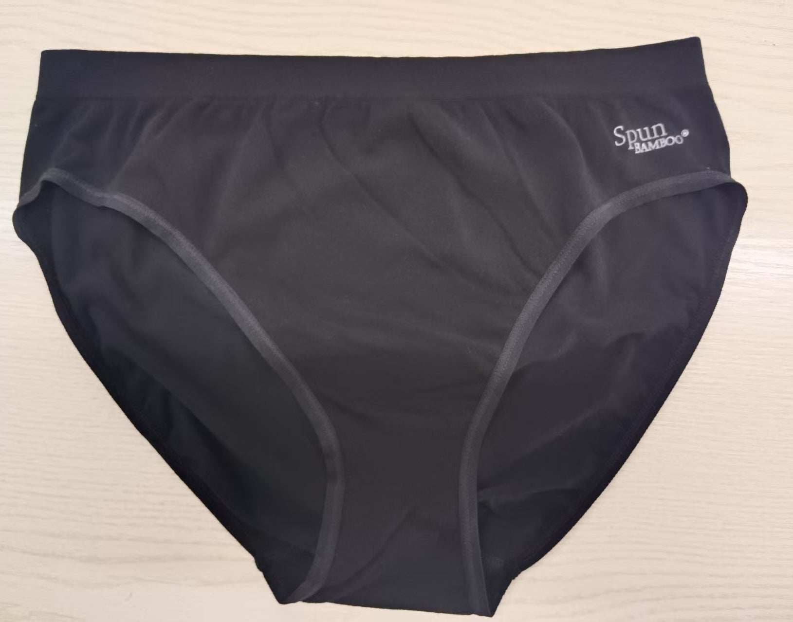 High leg brief in black Women's Bamboo/Cotton with smooth fabric, wide waistband, and contrast gray leg trim