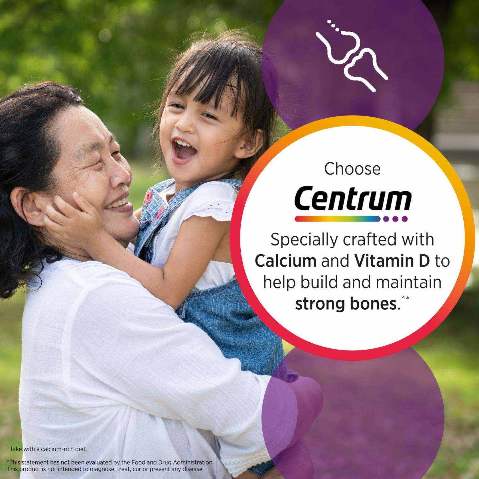 women's multivitamins with iron advertisement featuring a smiling older woman holding a young girl outdoors emphasizing calcium and vitamin D for strong bones