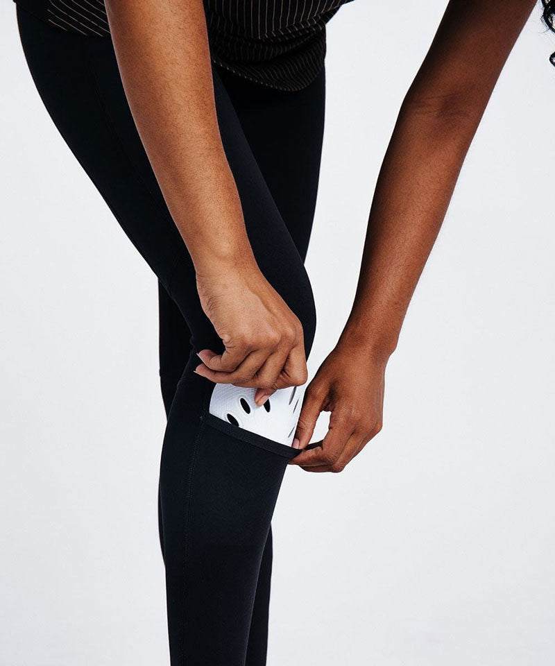 women's soccer tight with built-in shin guard pocket in black